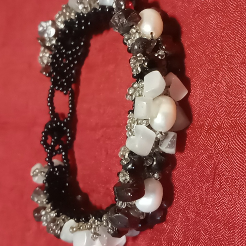 Mixed natural stone fresh water pearls seed beads and red,black,white stones.